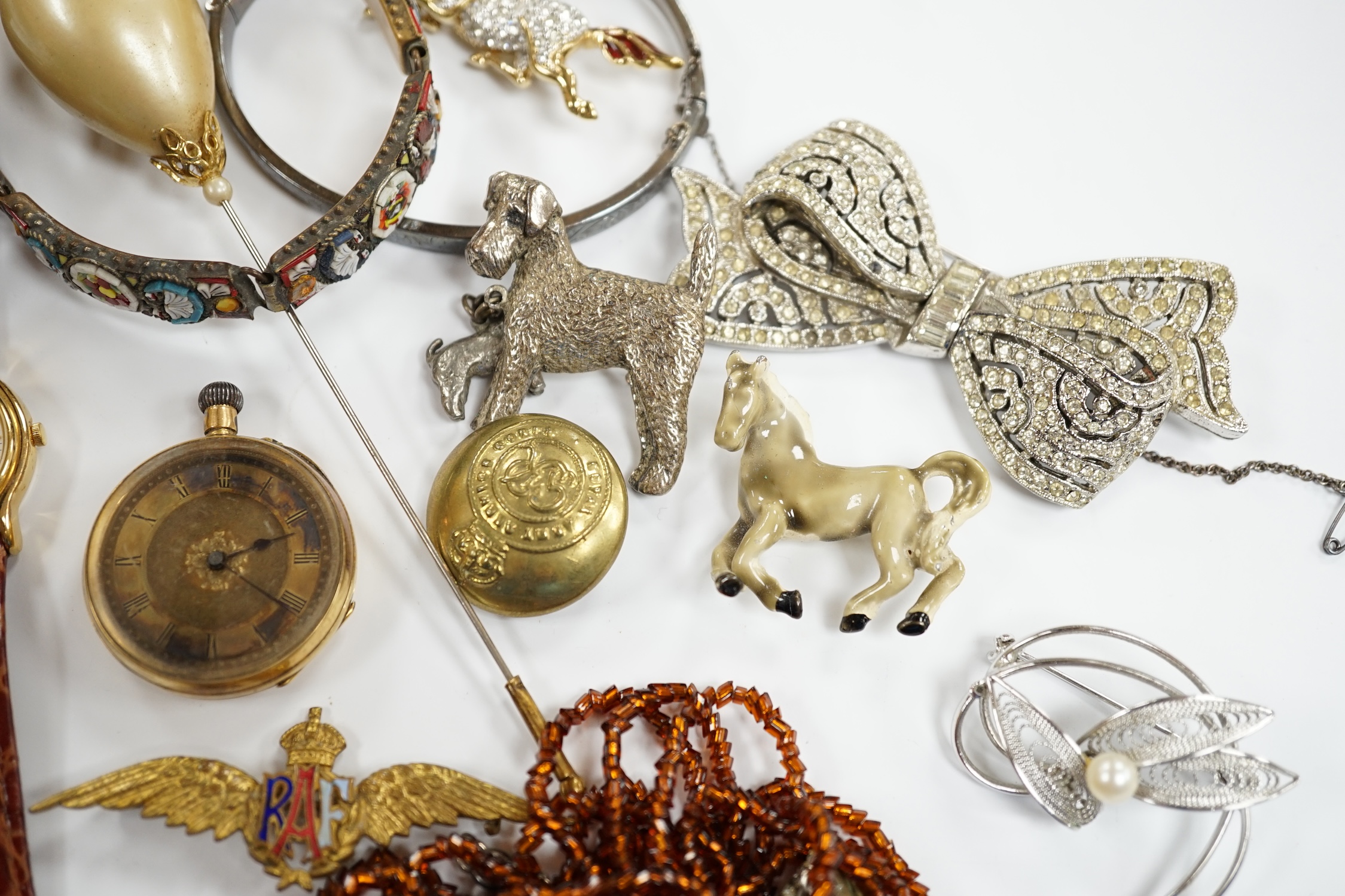 Two wrist watches, assorted badges and costume jewellery including paste set.